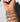 A close-up of a person's wrist wearing multiple beaded bracelets stackers. 