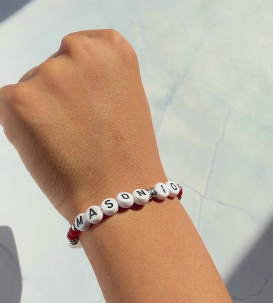 Video of custom children's football bracelet worn by a child
